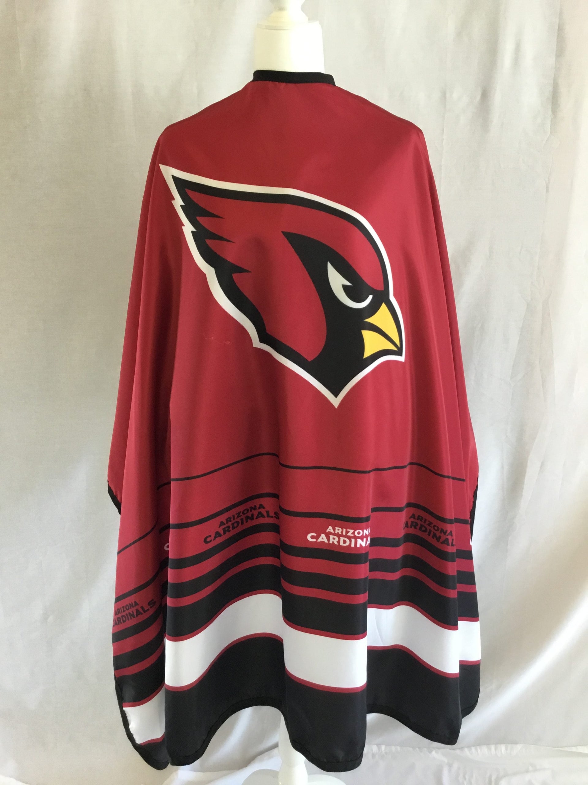 Arizona Cardinals branded professional barber cape with stainless steel snap closure