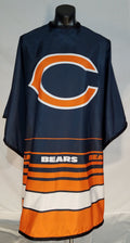 Chicago Bears fan cape in navy blue, orange, and white with stainless steel snap closure.