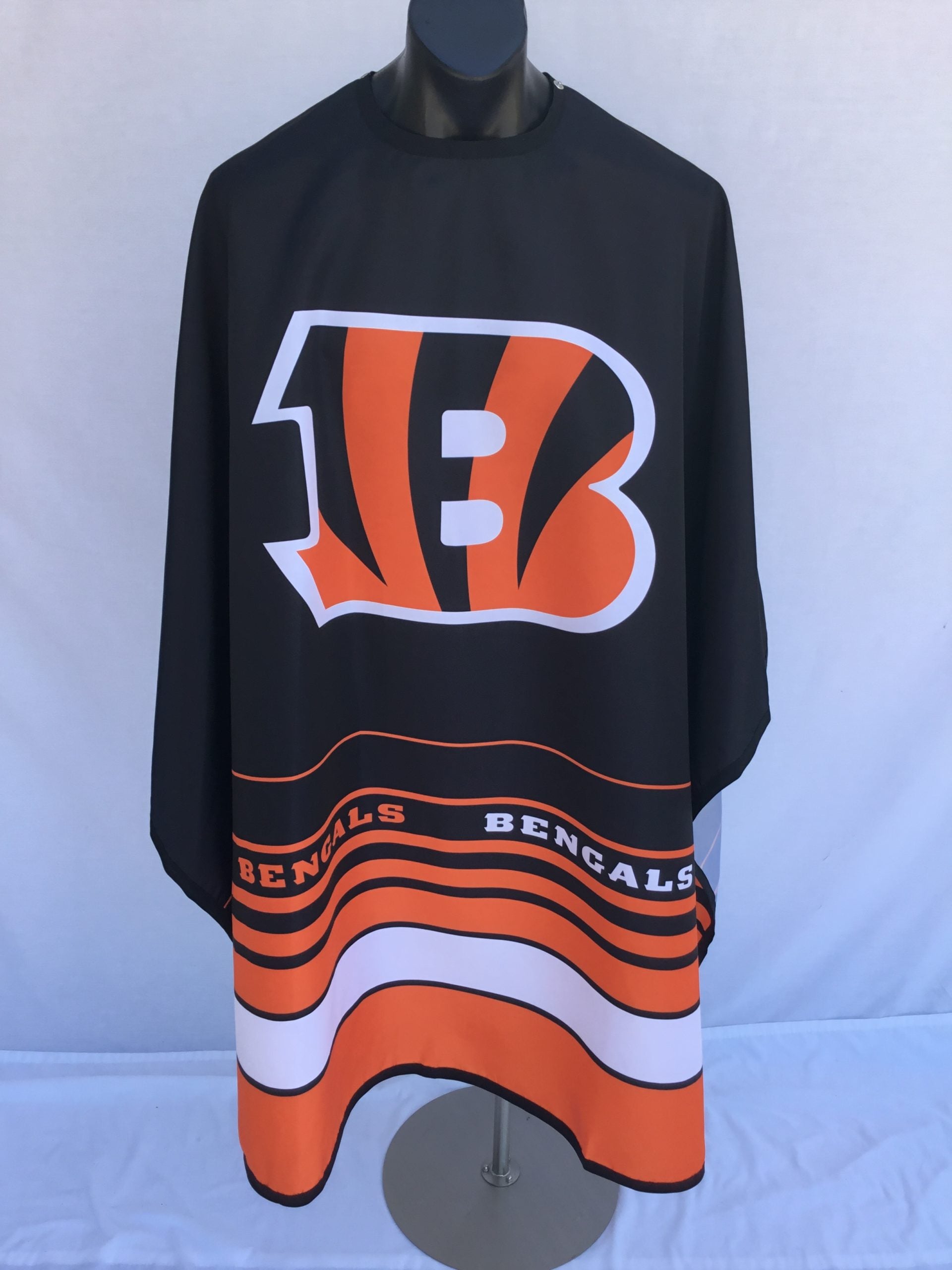 Cincinnati Bengals branded professional barber cape with stainless steel snap closure