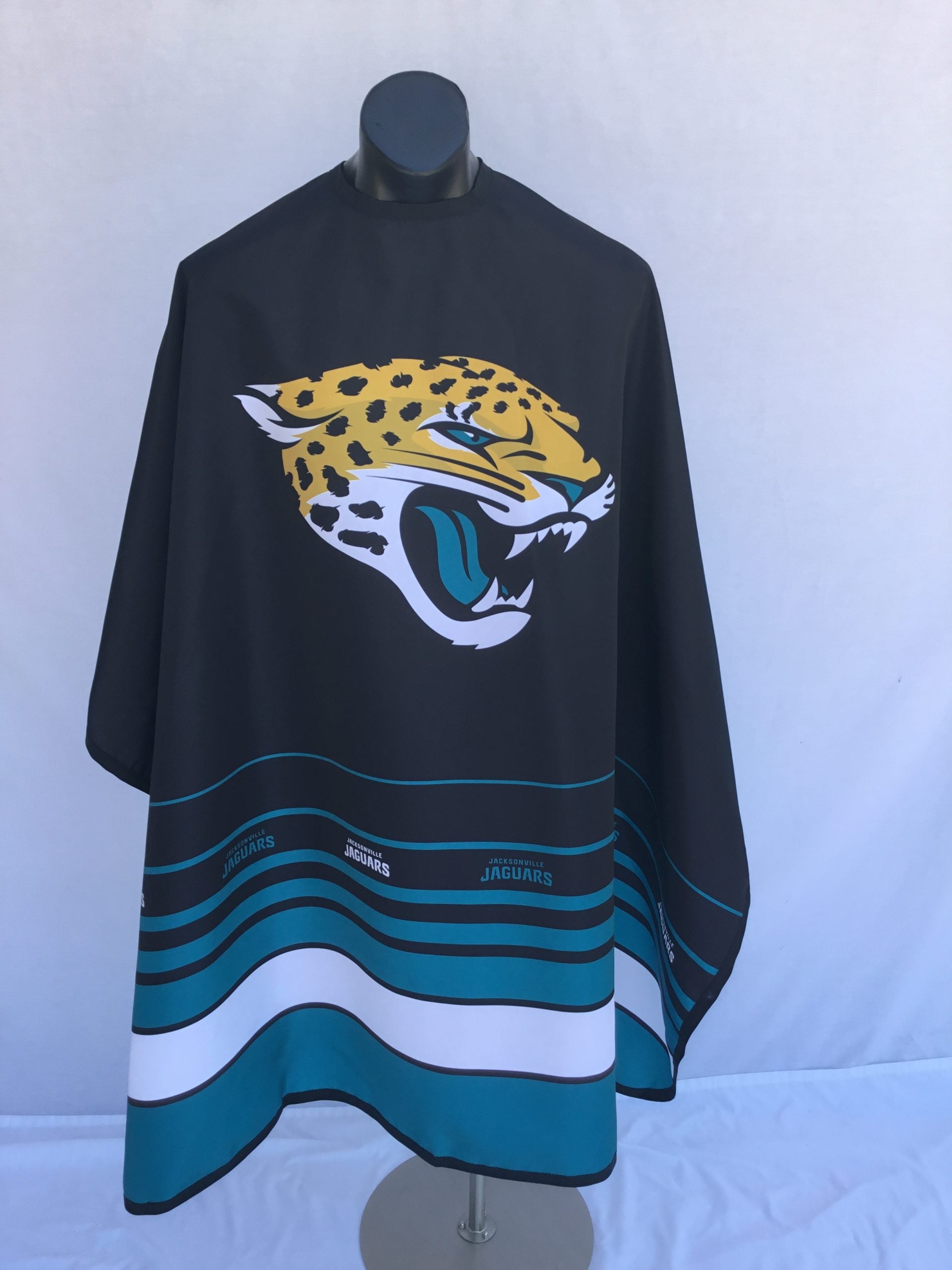 Jacksonville Jaguars barber cape with stainless steel snap closure