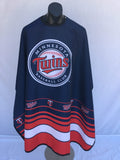 Minnesota Twins fan cape in navy, red, and white with team logo and snap closure