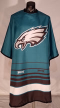 Philadelphia Eagles branded barber cape with adjustable snap closure