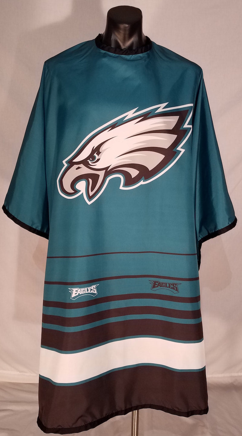 Philadelphia Eagles branded barber cape with adjustable snap closure