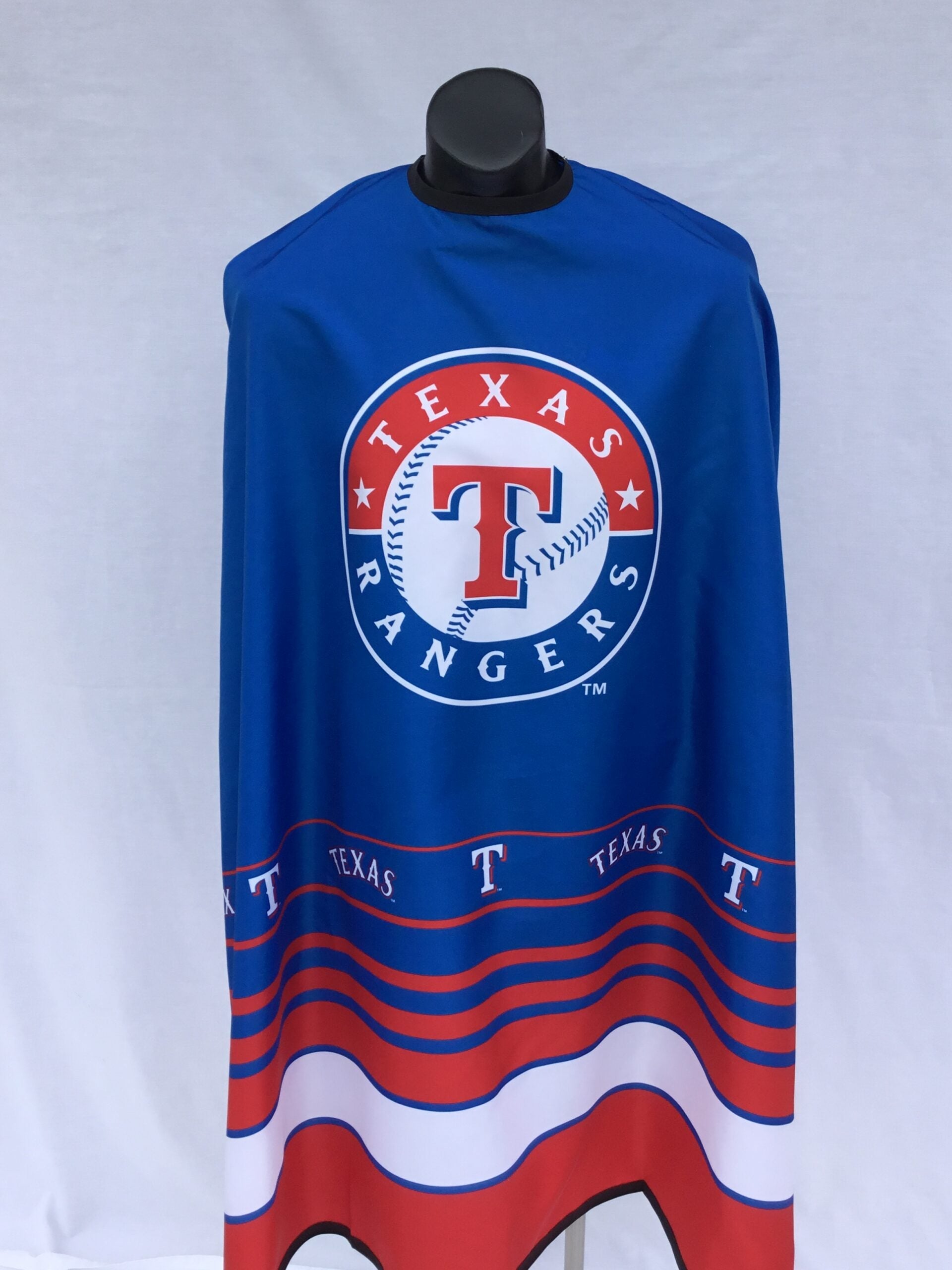 Texas Rangers themed fan cape in blue, red, and white with stainless steel snap closure.
