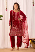 Elegant red velvet kurta set with intricate embroidery and sequence detailing.