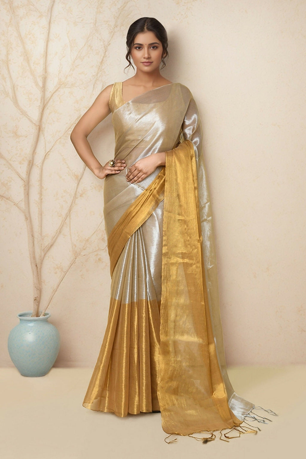 Elegant Joban Fashion Light Beige Tissue Saree featuring a subtle sheen and lightweight drape.