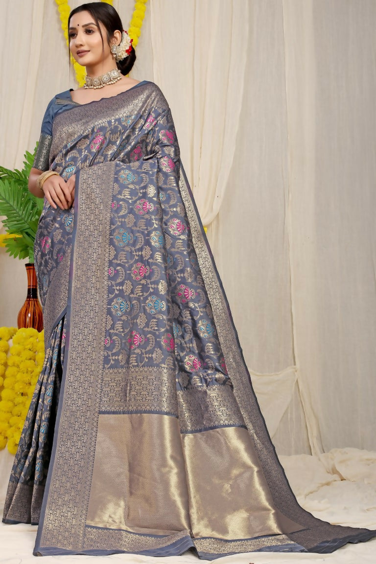 Grey Kanjivaram silk saree with zari woven borders and matching blouse piece.