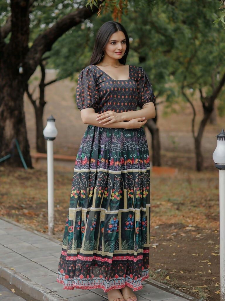 Woman wearing a black heavy digital printed pure Chanderi floor length Anarkali dress