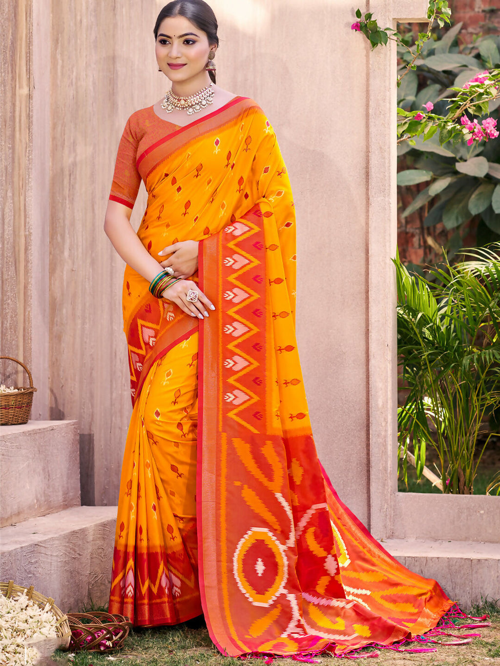 A beautiful vibrant yellow Pochampally silk saree with matching blouse fabric