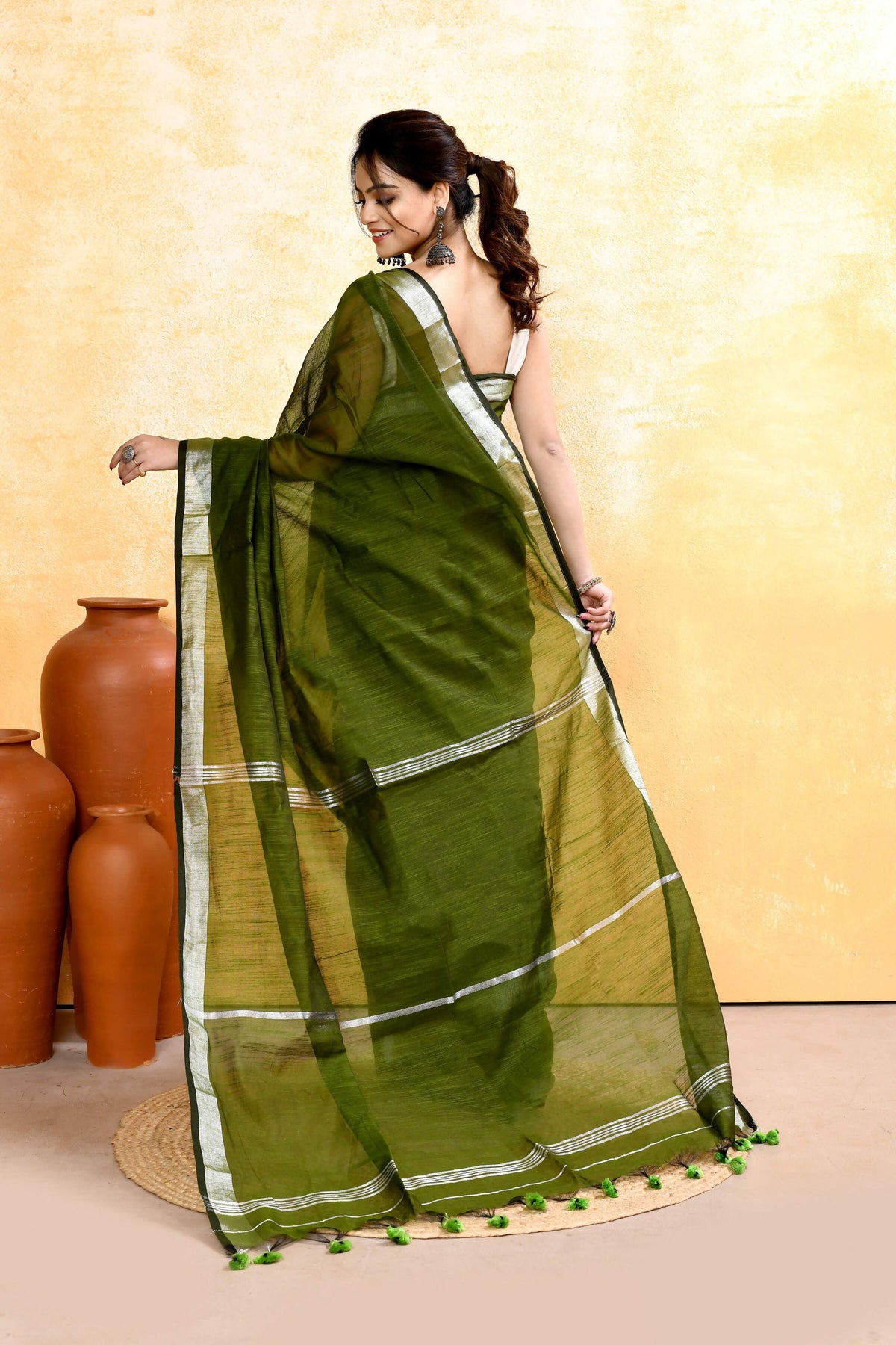 Moss Green Cotton Blend Handloom Saree with Embellished Zari Border
