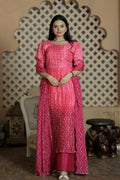 Pink muslin floral print kurta with crush pleating and puff sleeves, paired with trousers and dupatta.