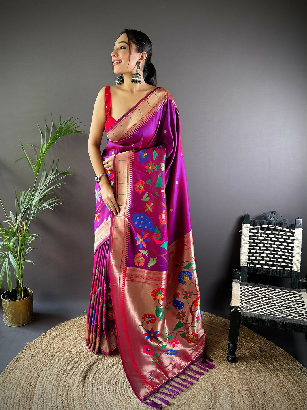 Rani Pink Paithani Saree with intricate traditional motifs and soft silk fabric