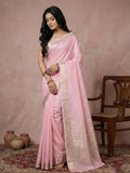 Model wearing a light pink cotton saree with a matching blouse piece