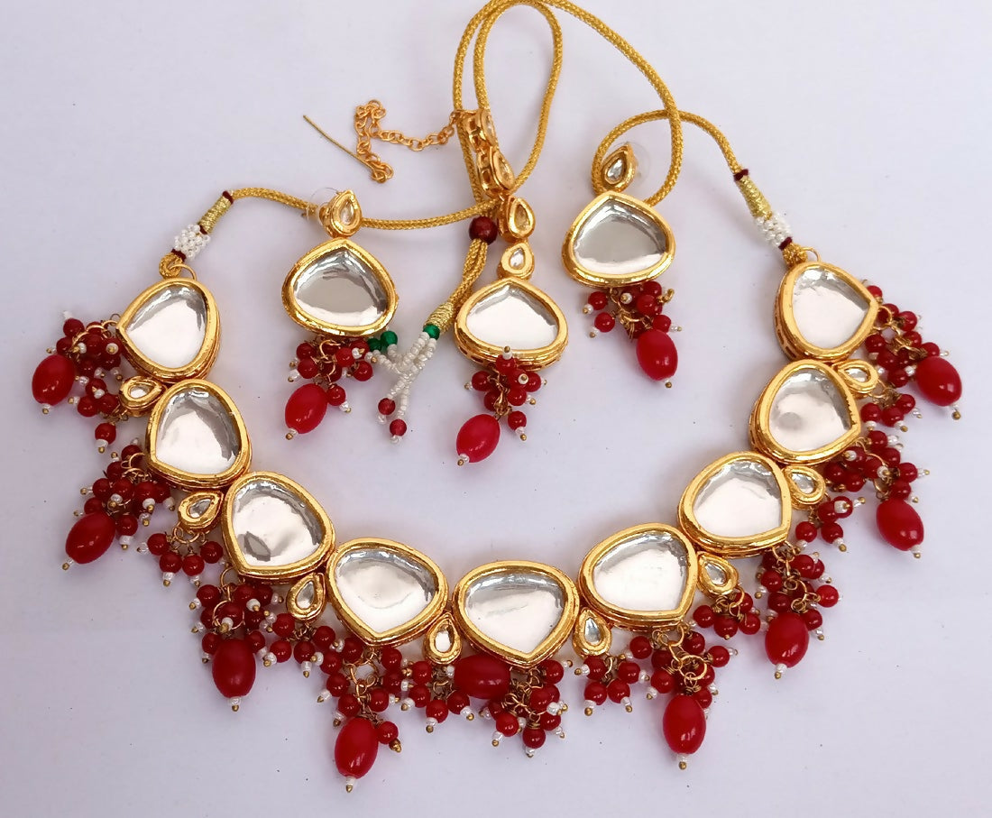 Handcrafted Red Kundan stone necklace set with gold plating and adjustable cord