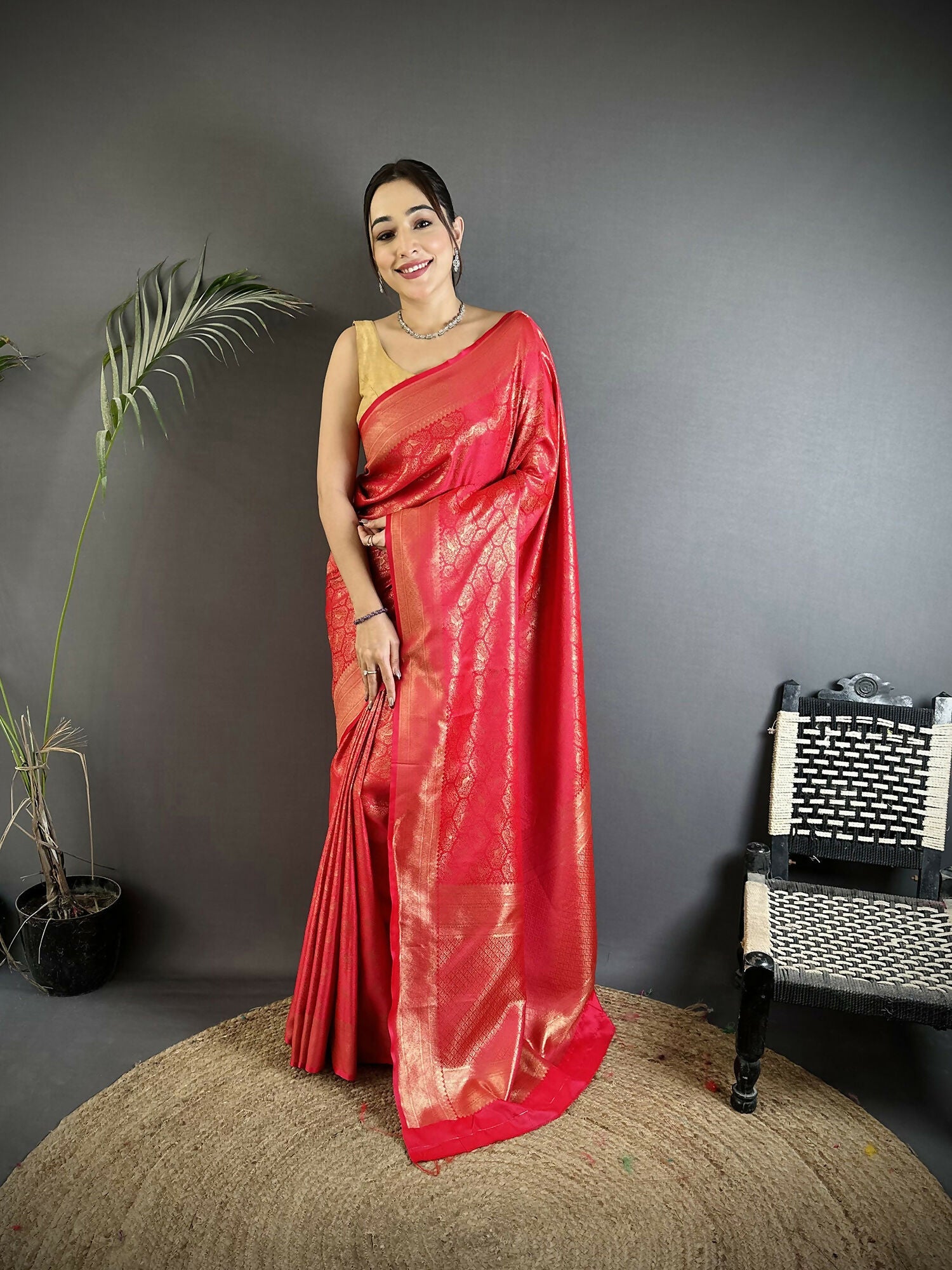 Elegant red satin silk Banarasi saree with paisley and floral prints