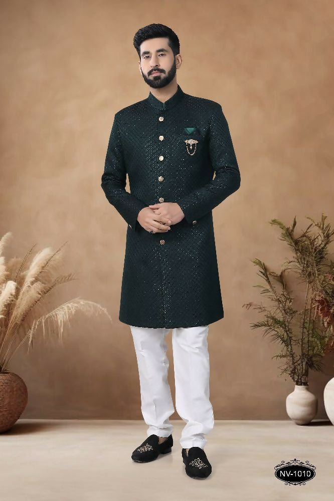 Men wearing a green silk Indo-Western kurta with all-over sequence and thread embroidery