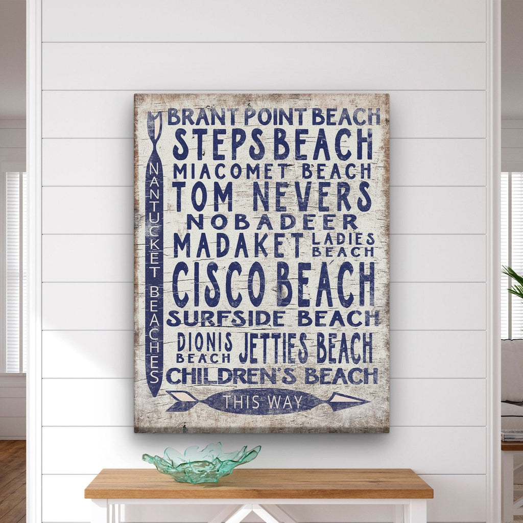 Vintage Nantucket directional beach sign featuring blue, white, and brown colors for coastal wall decor.