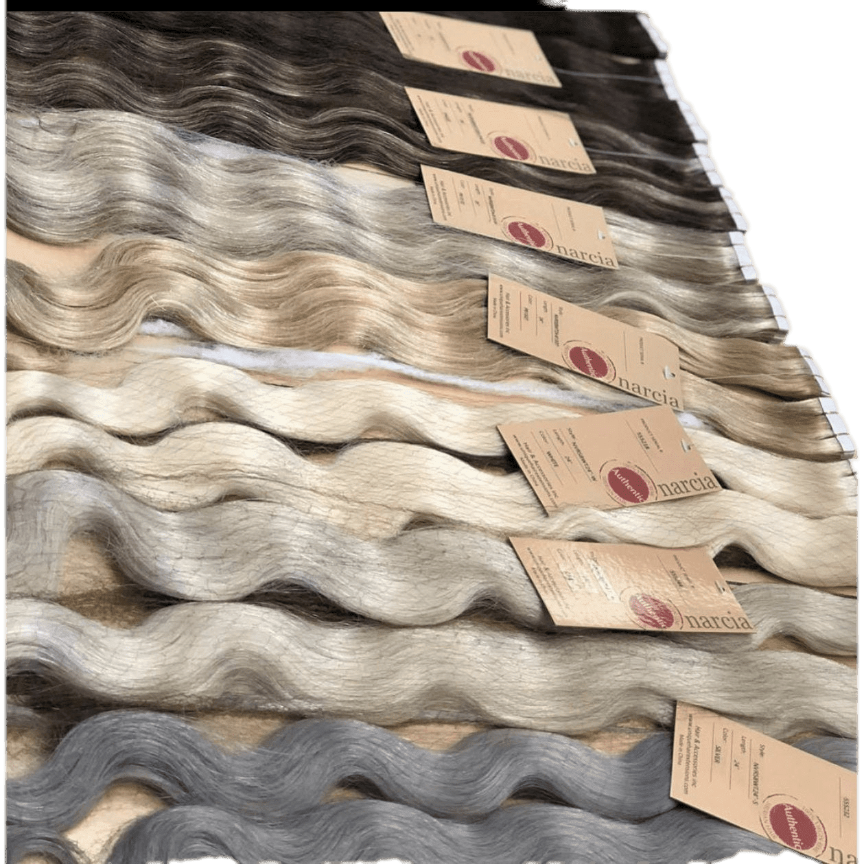 24 inch Siberian Remy Body Wave tape-in extensions with a silky, natural wavy texture