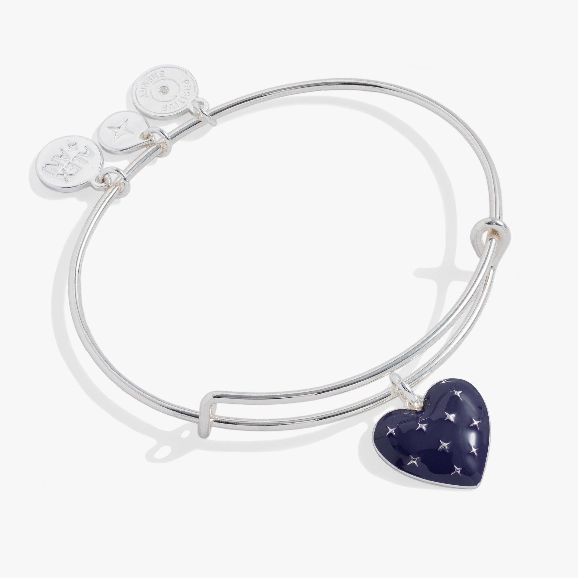 Navy enamel heart charm bangle with starburst detailing on an elegant metal band