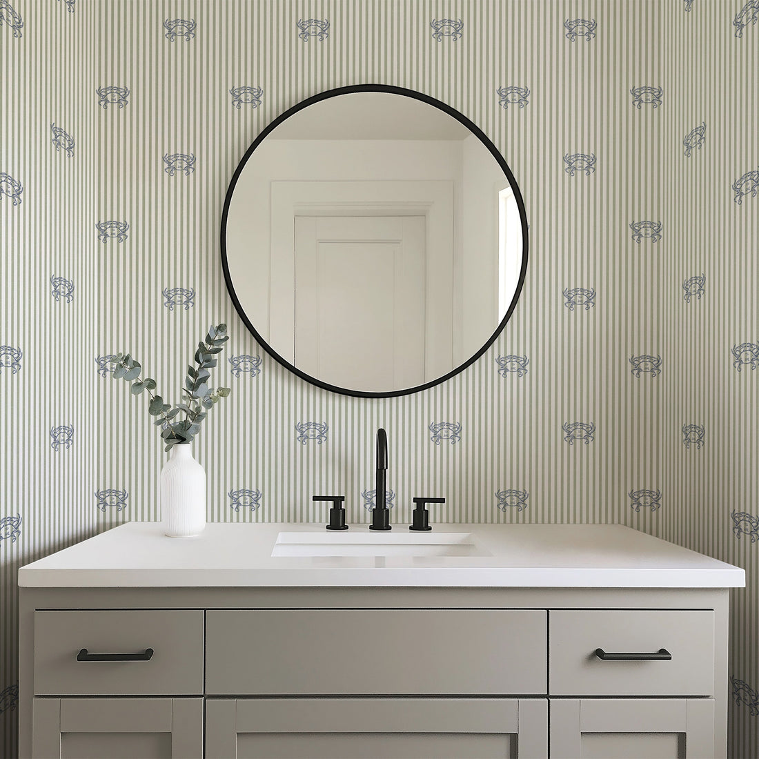Claude wallpaper in coastal blue and sage-green palette.