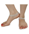 Two 10-inch silver-tone copper anklets showing chain detail and high-shine finish