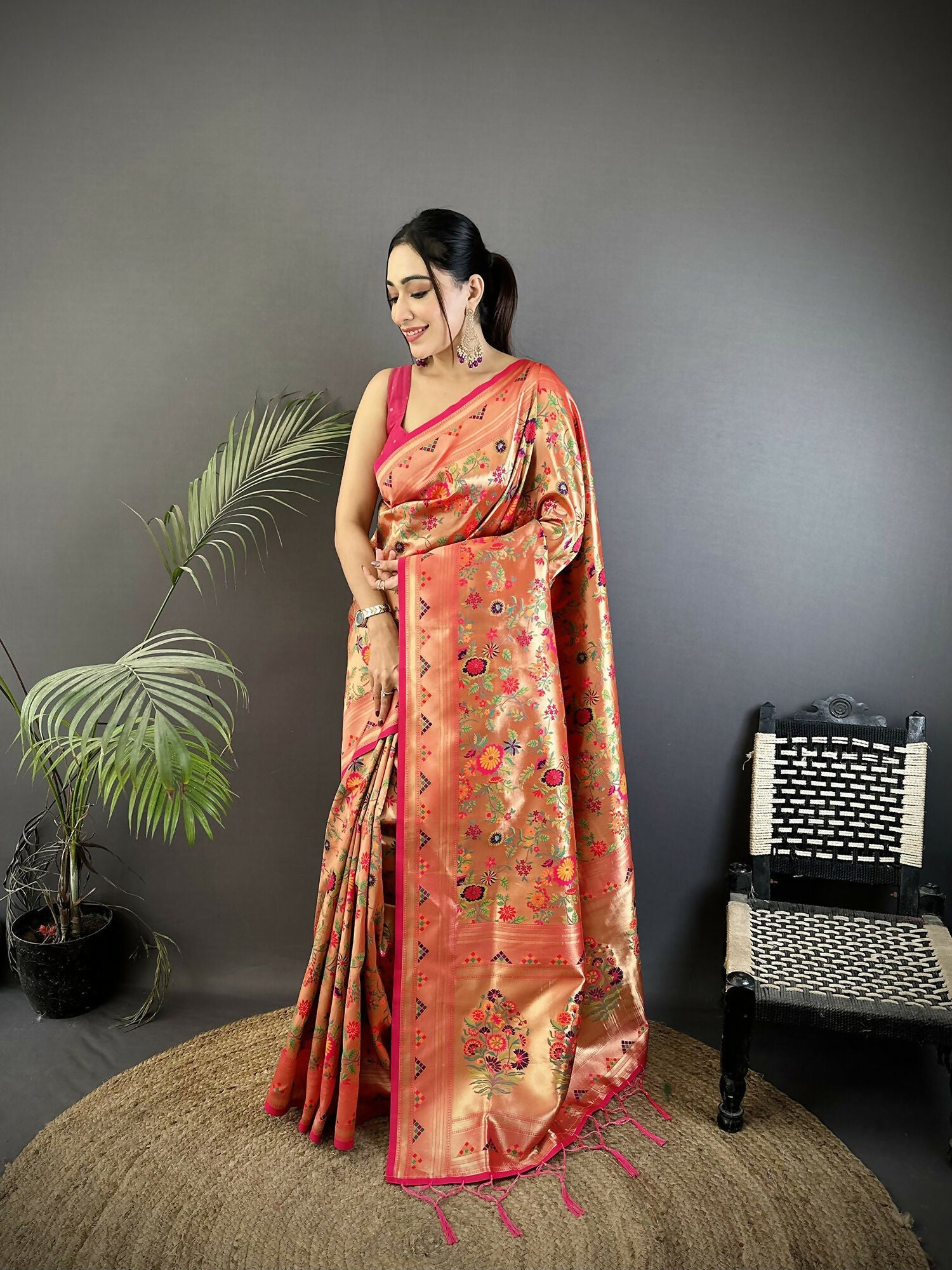 Peach Soft Silk Paithani saree with intricate floral and leaf motifs
