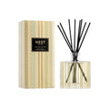 NEST New York Birchwood Pine Reed Diffuser in elegant glass vessel with reeds