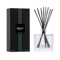 Minimalist clear glass FOREST RAIN reed diffuser with black and white packaging