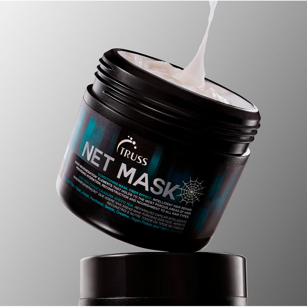 Black and white container of Truss Net Mask Conditioning Mask with fiber effect.