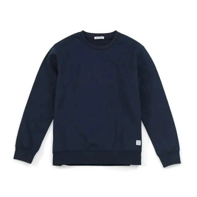 Unisex minimalist crew neck knit sweatshirt in beige, available in neutral earth tones for casual wear.