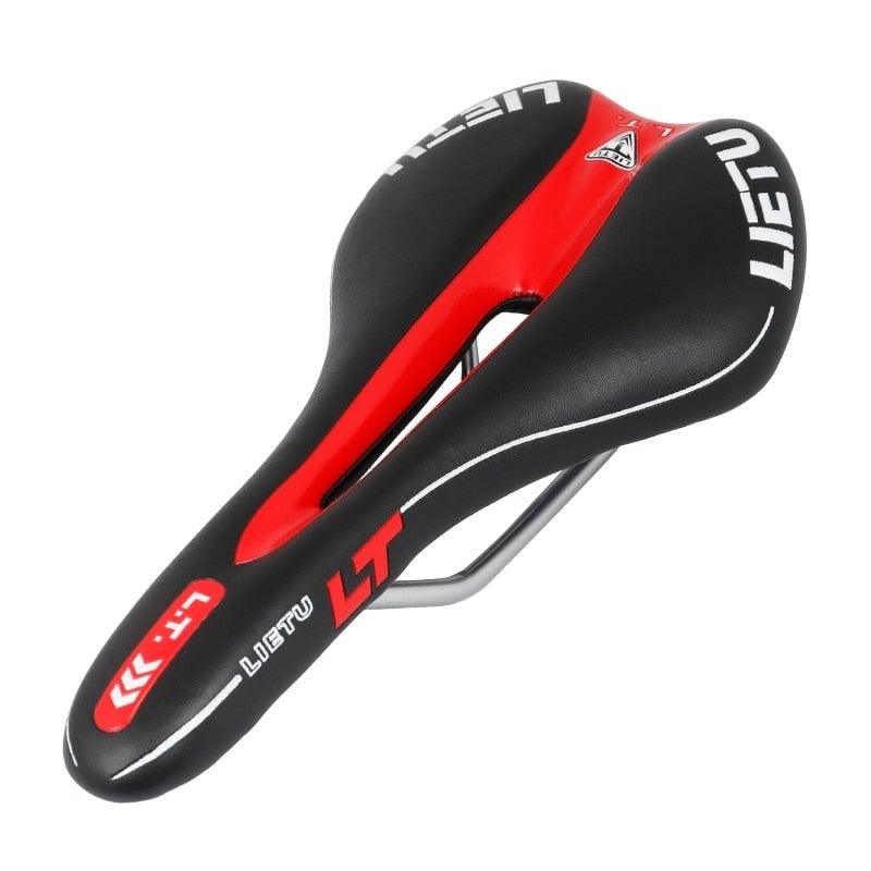 Ergonomic black road bike saddle with perforated PU leather texture and steel rails.