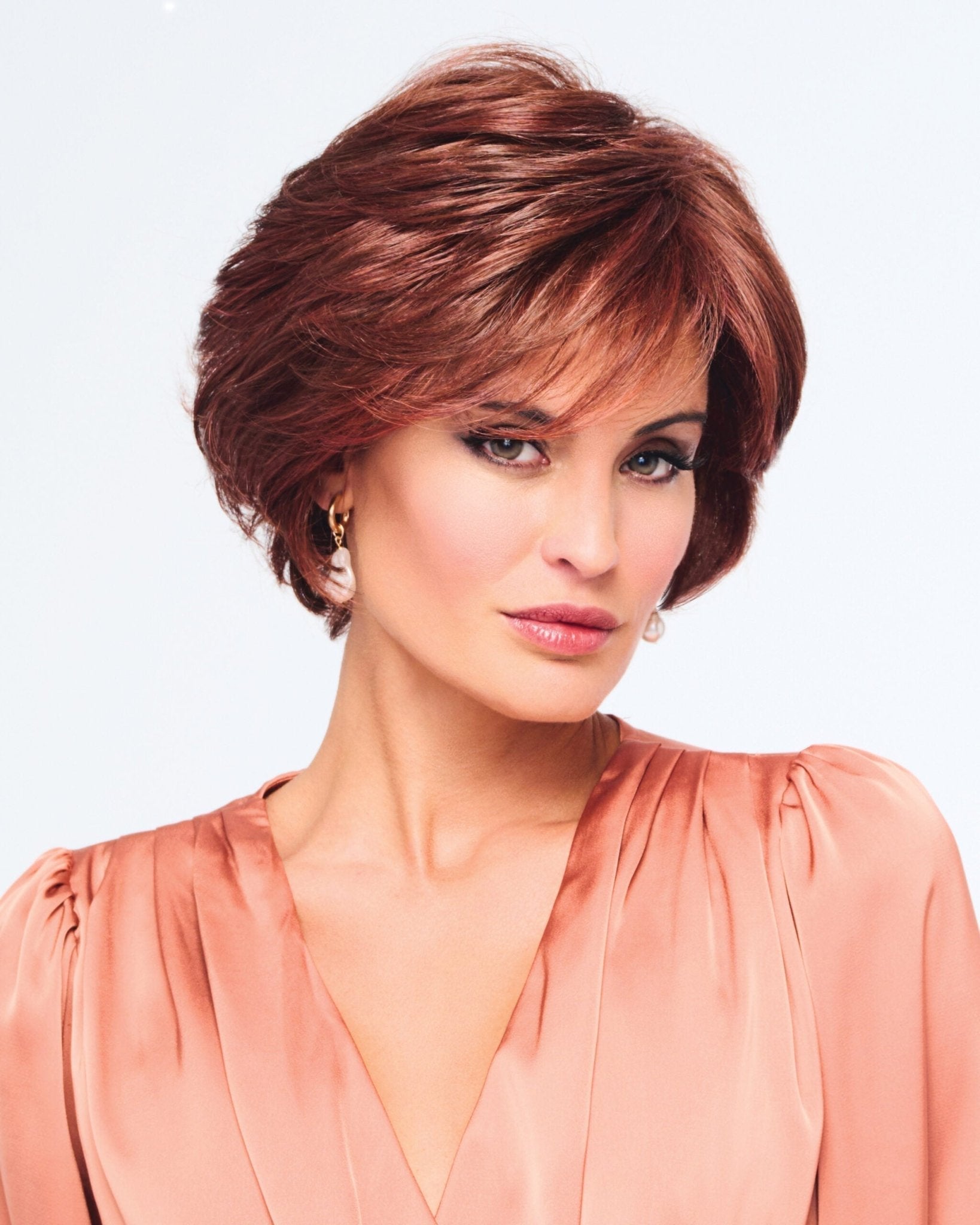 Captivating Canvas multi-layered crop wig in copper-red with lace front detail.