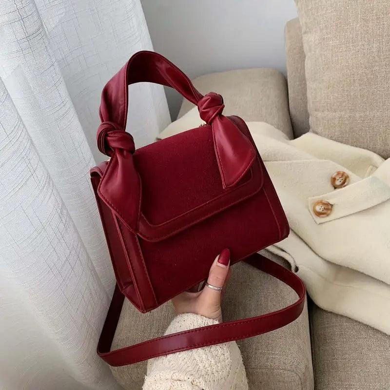 Classic Designer Shoulder Bag with Genuine Suede and Metal Accents