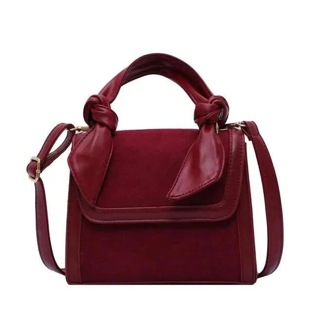 Classic Designer Shoulder Bag with Genuine Suede and Metal Accents