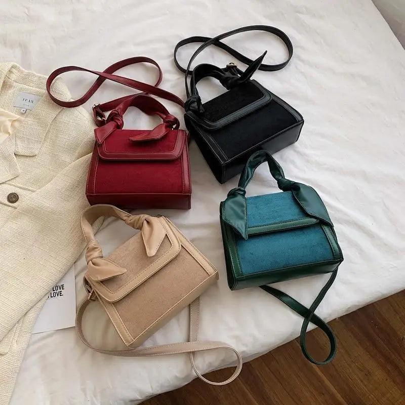 Classic Designer Shoulder Bag with Genuine Suede and Metal Accents