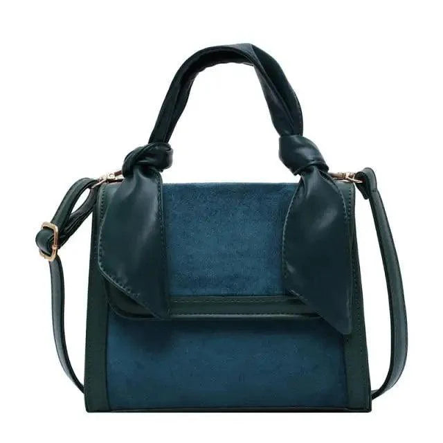 Classic Designer Shoulder Bag with Genuine Suede and Metal Accents