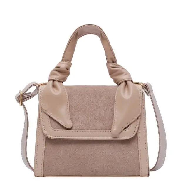 Classic Designer Shoulder Bag with Genuine Suede and Metal Accents