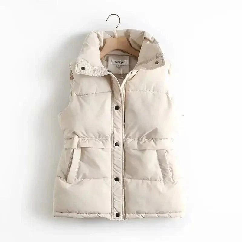 Women's padded long vest with stand collar and drawstring waist in black and beige.