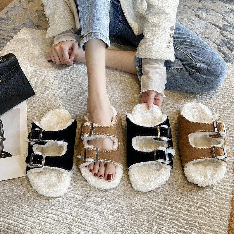 Women's cozy fur-lined clog slippers with adjustable buckle straps in a neutral colorway.