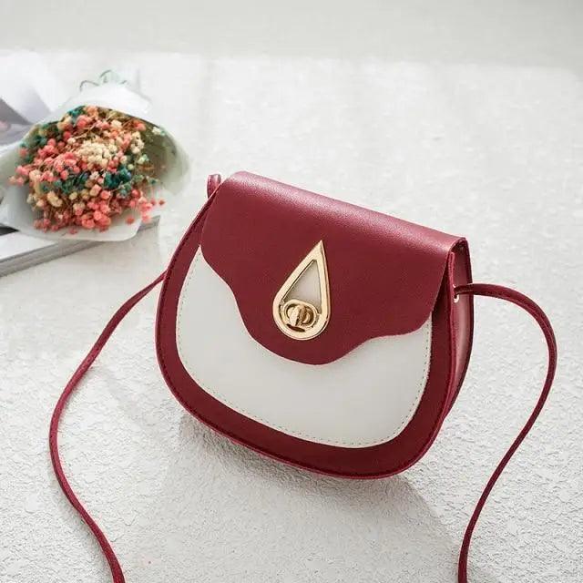 Fashionable PU Leather Crossbody Bag with Tassels and Zip Pockets