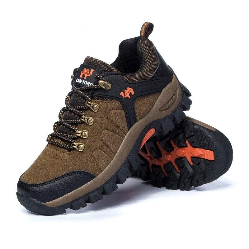 Men's waterproof outdoor hiking sneakers in dark brown and black with orange accents.