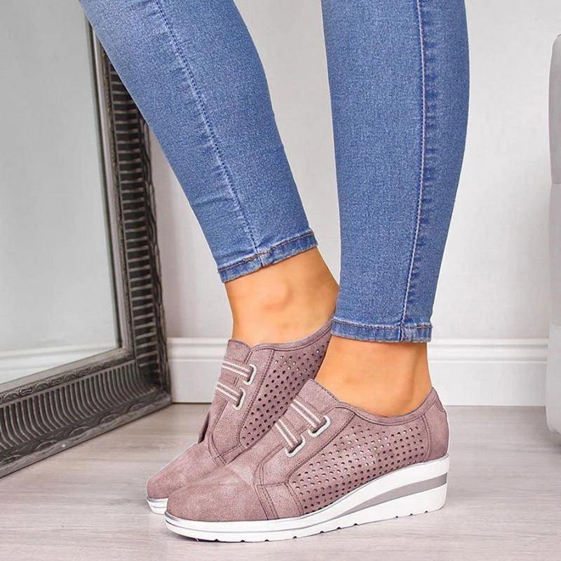 Women's casual platform sneakers in breathable leather with air cushion sole and height-increasing design
