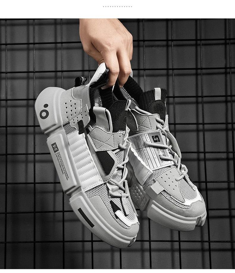 Men's lightweight breathable mesh athletic sneakers in solid black for streetwear styling.