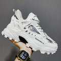 Unisex chunky streetwear sneakers in black and white with thick sole design