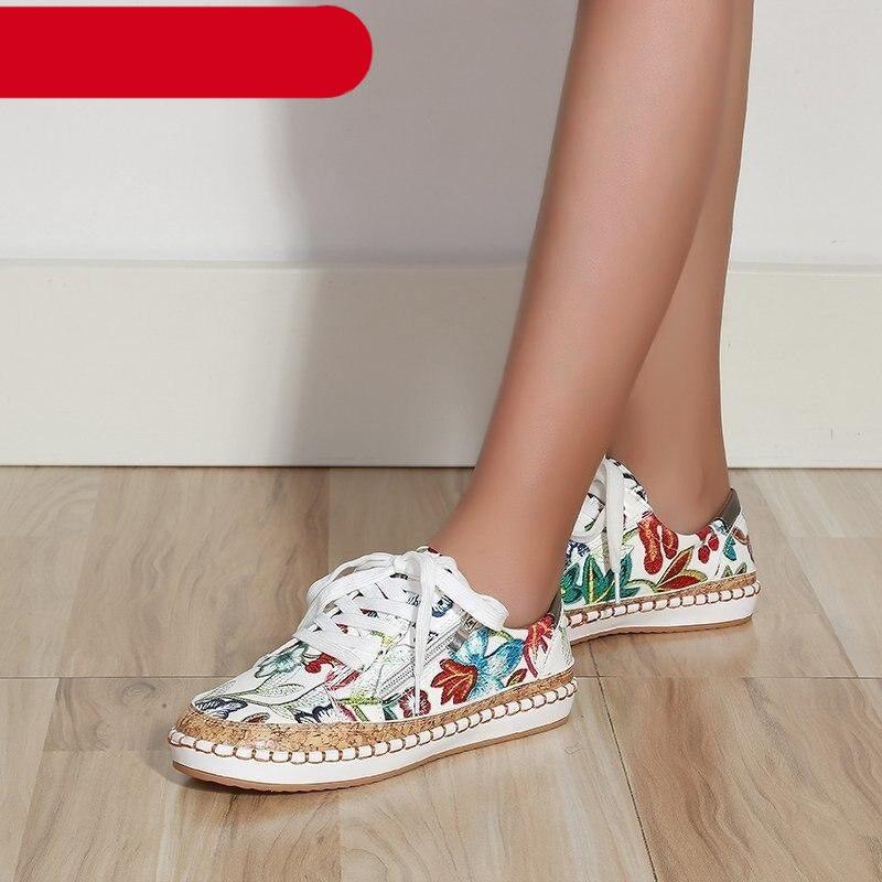 Women's white casual sneakers with beautiful floral print and lace-up closure