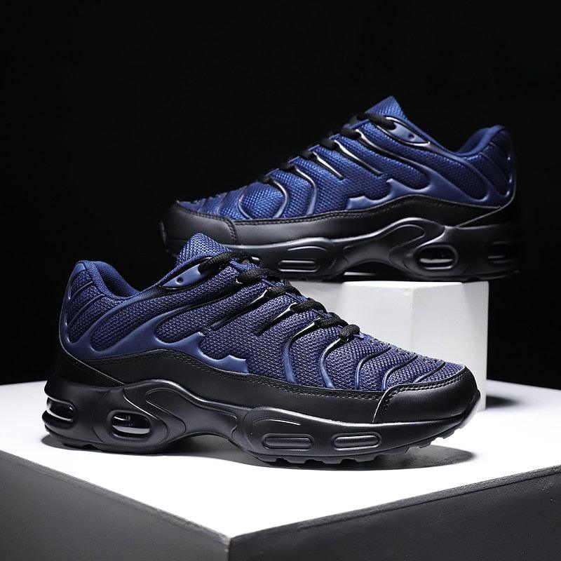 Men's professional athletic running shoes with high-traction rubber outsole for road and court use.