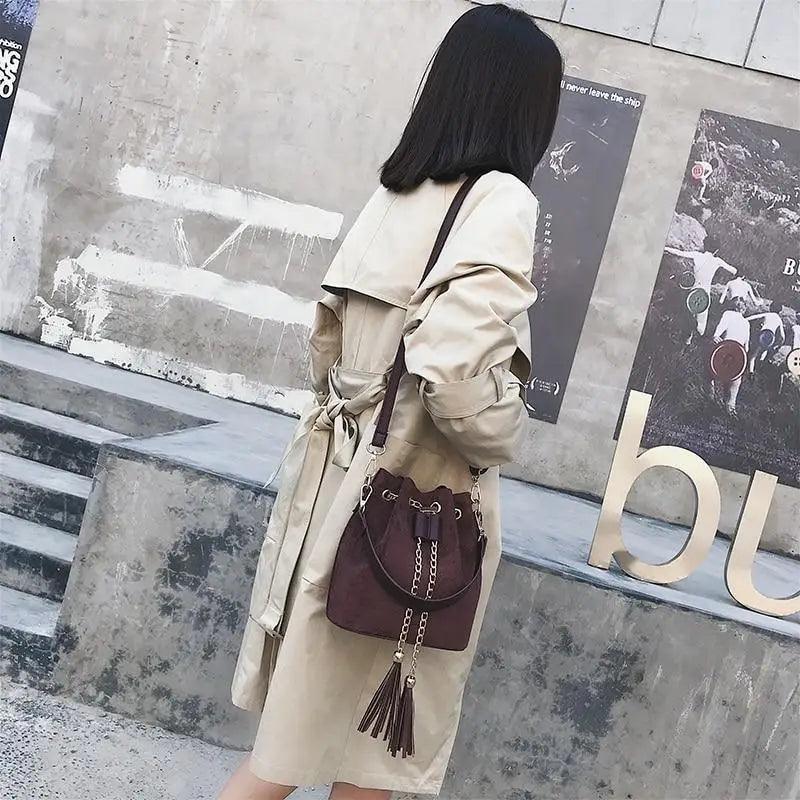 Mini Bucket Crossbody Bag with Tassel and Drawstring Closure
