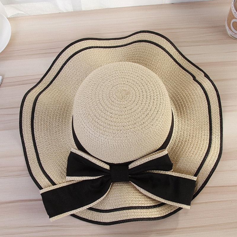 Women's Wide Brim Straw Beach Hat with Luxury Bowknot Detail
