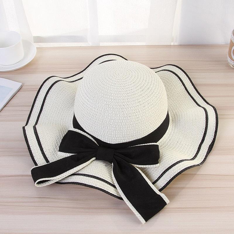 Women's Wide Brim Straw Beach Hat with Luxury Bowknot Detail