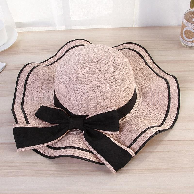 Women's Wide Brim Straw Beach Hat with Luxury Bowknot Detail